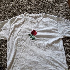 Brandy Melville White top with rose decal